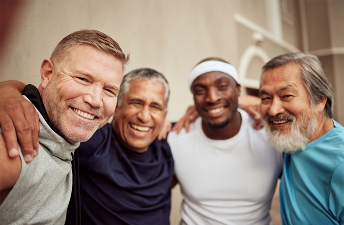 Senior men, fitness and smile portrait outdoor together for exercise motivation, retirement health support and diversity on training workout. Elderly athletes, happiness and sports friends wellness